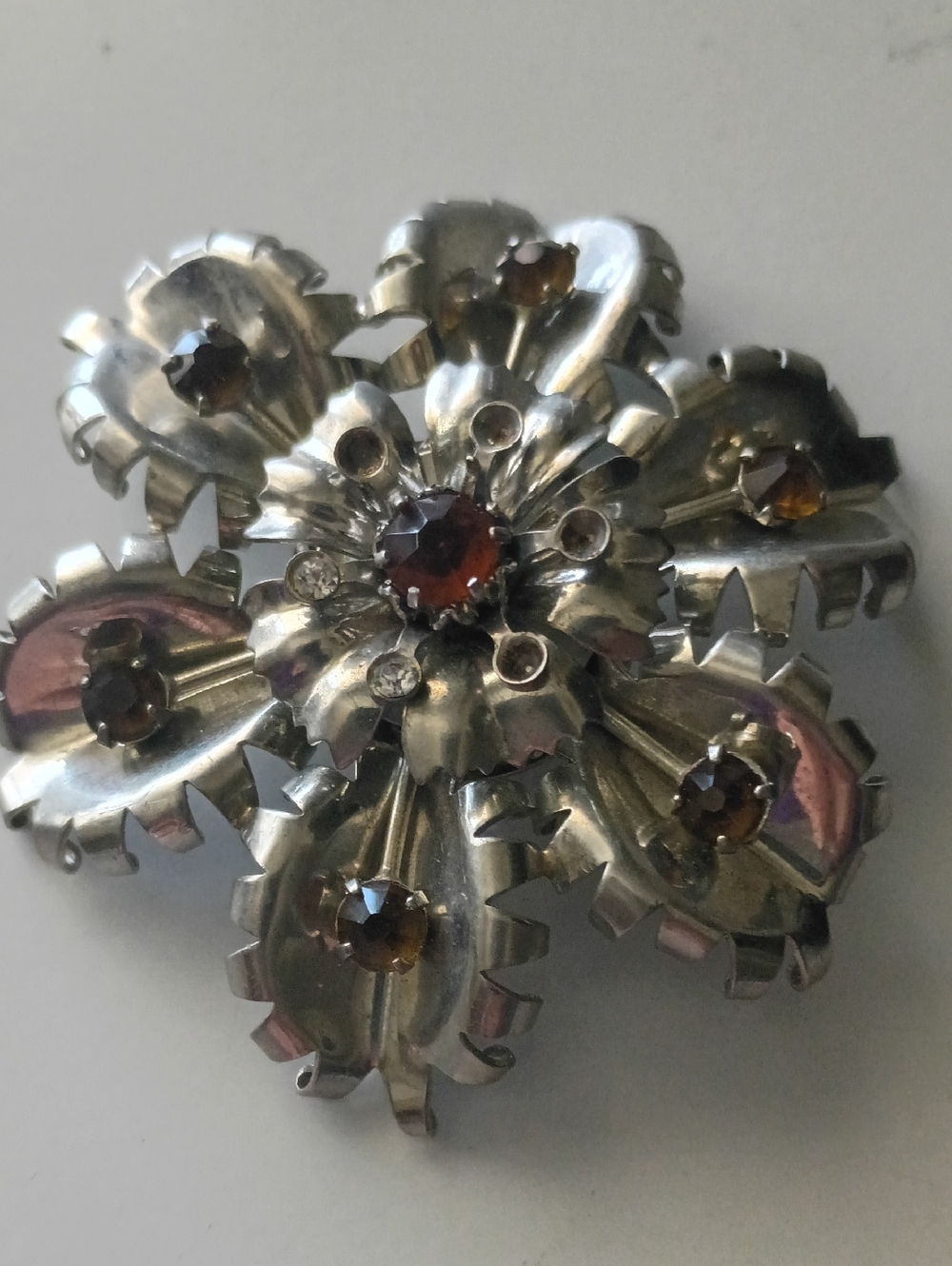 RARE Unique Vintage Snowflake Riveted Brooch With Amber Colored Glass
